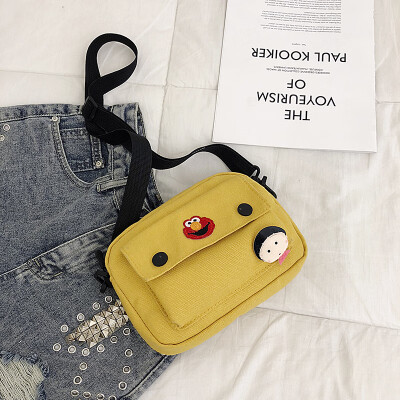 

Casual fashion ugly sesame street canvas bag female 2019 new cute cartoon simple versatile shoulder Messenger bag