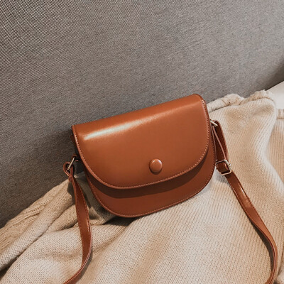 

Sen retro small bag female 2018 new Korean version of the wild semi-circle saddle bag texture solid color shoulder Messenger bag