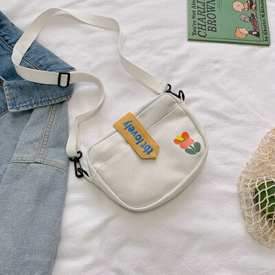 

Small bag canvas bag woman single shoulder oblique satchel college students in summer simple ancient feeling girl ins forest depar