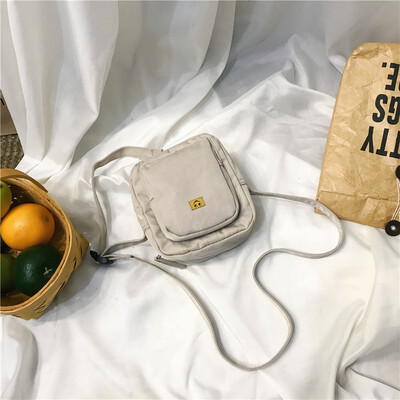 

Small bag canvas bag woman single shoulder oblique satchel student Mori hundred Han version of the ancient feeling girl ins bungee