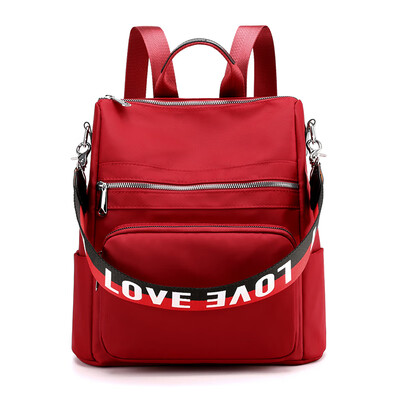 

The Korean version of the double shoulder bag is popular with students wrapped in nylon Oxford cloth small backpack canvas nylon