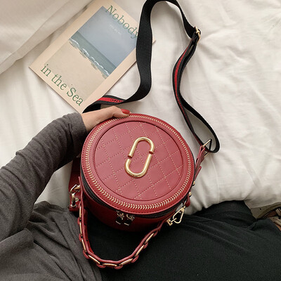 

Qiao Bani 2019 new South Korea ins fashion embroidery thread rhombic ribbon small round bag shoulder shoulder diagonal female bag