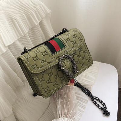 

Qiao Bani 2019 new European&American style fashion ribbon PU indentation hit color wine god bag slant diagonal cross trend handbags