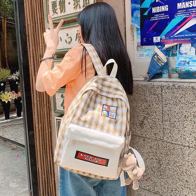 

Mm-hmm Plaid bf wind ancient feeling bag female Korean high school ins wind simple Mori junior high school backpack