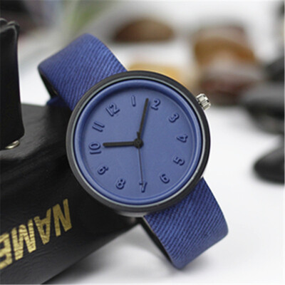 

Korean casual fashion watch male student canvas belt simple three-dimensional digital scale couple quartz female watch