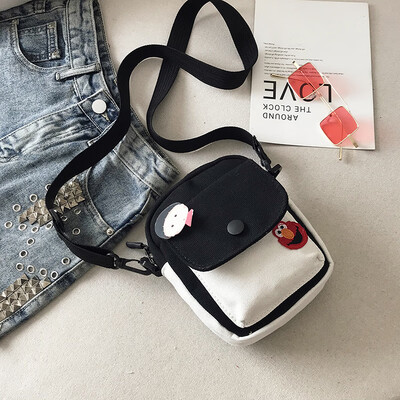

2019 new simple&versatile fashion contrast color shoulder Messenger bag female casual cute cartoon sesame street canvas bag