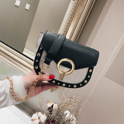 

Qiao Bani 2019 new Korean fashion Dongdaemun rivet flip bag shoulder diagonal tide handbags a generation