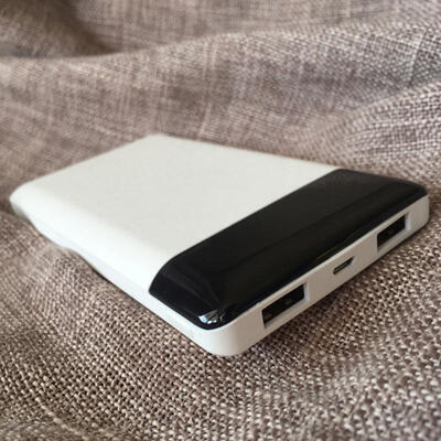 

Ultrathin Portable Double Micro USB Ports 10000mAh Li-polymer Battery Mobile Power Bank Fast Charging