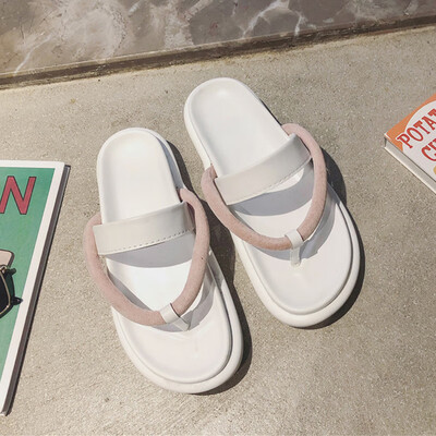 

The flip-flops women wear wild casual fashion Korean version of sponge cake thick bottom slippers with clip feet net red sandals s