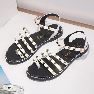 

Sandals woman summer Korean version rivets flat bottom sandals female one-toed student beach Roman shoes