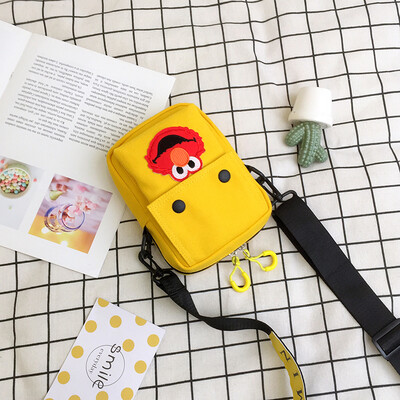

2019 new casual fashion ugly sesame street canvas bag female cute cartoon simple versatile shoulder Messenger bag