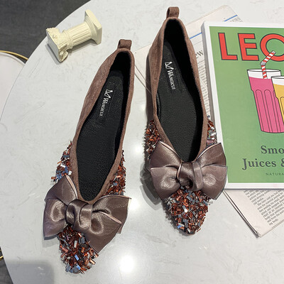 

Pointed single-shoe womens spring Korean version of lady shoes hundred bright one-sided bow flat-bottomed social bean shoes