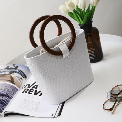 

2017 summer new Korean version of the straw wrapped wood ring handbag simple shoulder bag large capacity package