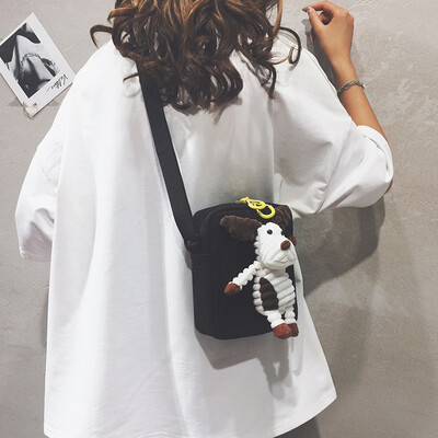 

Childrens small bag female 2019 new cartoon cute doll Messenger bag Korean version of the wild canvas shoulder mini bag