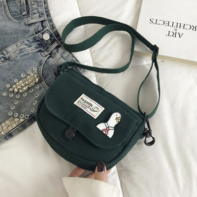 

Fashion letter temperament shoulder bag female 2019 summer new cartoon cute saddle bag casual wild canvas bag