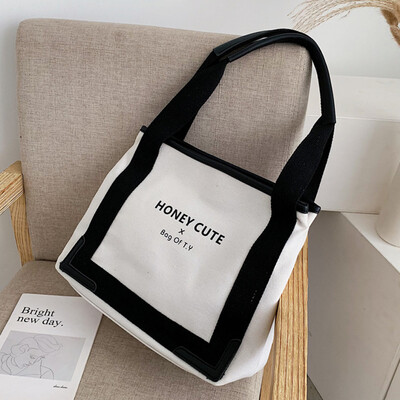 

2019 new Korean fashion street fashion canvas contrast handbag shoulder diagonal fashion womens bags