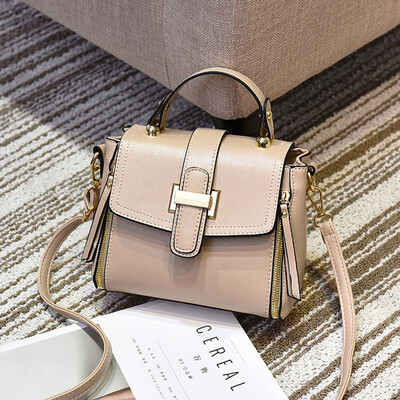 

On the new small bag female contracted Korean Messenger bag retro art shoulder portable summer bucket bag