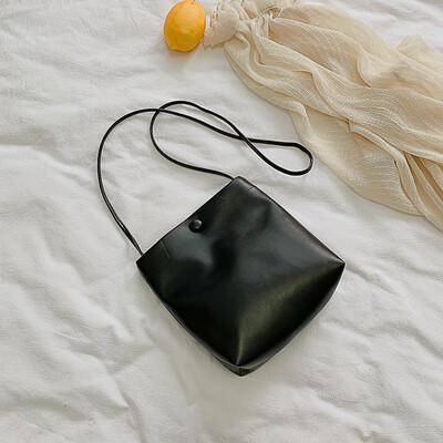 

2019 new simple temperament retro solid color bucket bag female fashion Korean casual wild shoulder messenger bag