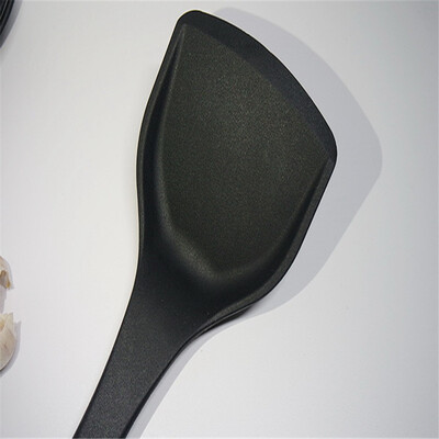 

Silicone spatula with straight handle either in black or red color