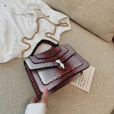 

Qiao Bani 2019 new European&American style fashion snake pattern transition color BV snake head flip cover shoulder shoulder diagonal handbag