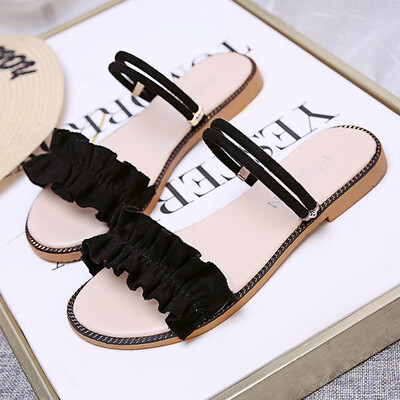 

Sandals female summer flat-bottomed Korean version 100 fairy sandals bow tie students wear two sandals on their toes
