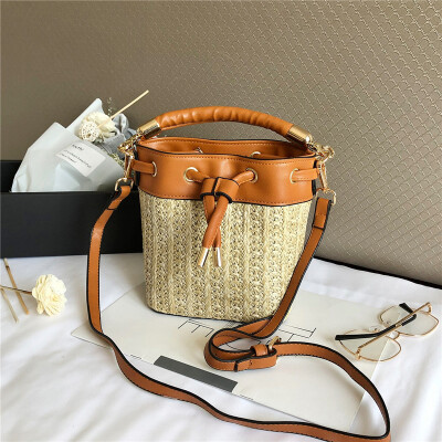 

Small bag female new straw bag Korean version of the wild Messenger bag woven beach bucket bag tide