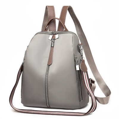 

Oxford double shoulder bag woman tide Korean version of tide canvas schoolbag single shoulder dual purpose leisure travel backpack