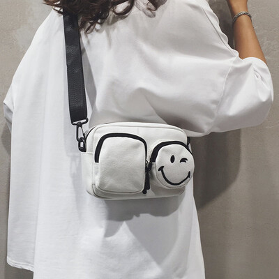 

Ins super fire on the new canvas casual slung packet female 2019 new Korean version of the wild net red shoulder small square bag