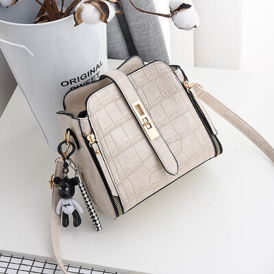 

On the new small bag bucket bag fashion fresh stone messenger bag net red texture shoulder ins super fire
