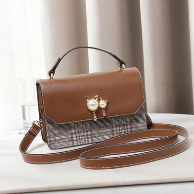 

Summer ins super hot handheld girl on the Korean version of the hundred lap shoulder slant bag fashion