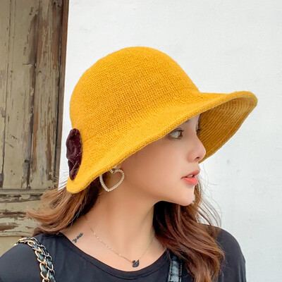 

Fall&Winter 2009 Fishermans Cap New Cute Butterfly Knot Korean Edition Ladys Pure-color Fresh Baitie Knitted Wool Cap