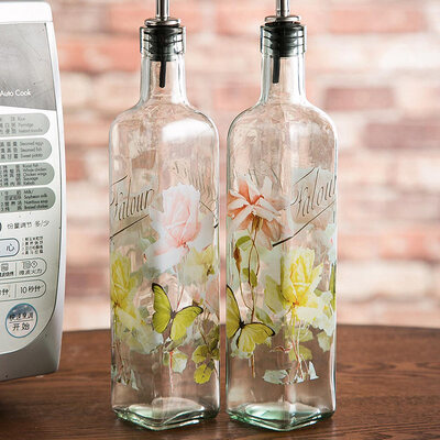 

A Ting Glass Dispenser Oil Bottles Set of 2 Floral 17 oz