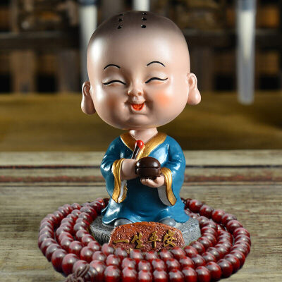 

Guangshunfa creative car decoration car decoration office decoration car ornaments shaking head small monk car ornaments cartoon car decoration products wish to become