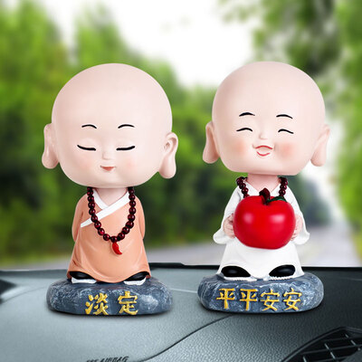 

Guangyin handmade car ornaments car accessories creative inspirational shaking head small monk two Buddha statues car supplies refueling