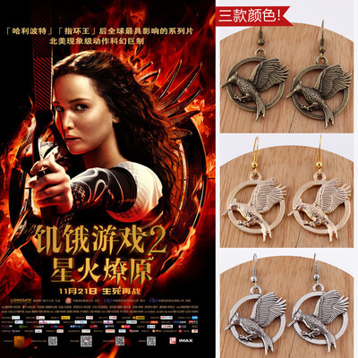 

Hunger Games Earrings Handmade Jewelry personality Phoenix Parrot Bird bow Vintage glod bronze silver E192