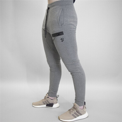 

Muscle Dr brothers mens casual sports pants beam mouth fitness outdoor new hot feet Slim trousers
