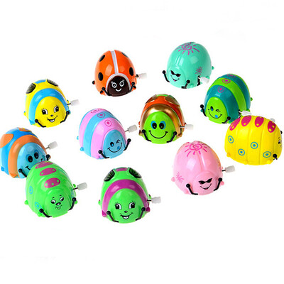 

1pc Random Clockwork Beetle Toy 2017 Funny Cartoon Animal Type Kids Baby Toys Small Chain Beetle Dump on the Chain