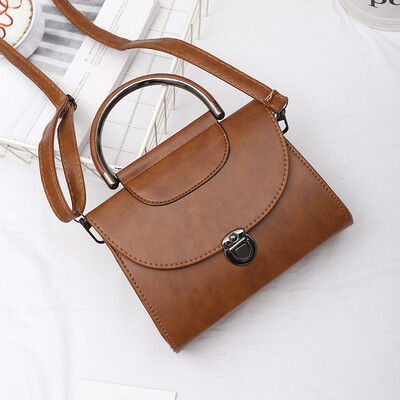 

Womens Bag 2018 New Hand-held Single Shoulder Bag Iron Clad Small Package Wholesale Bag