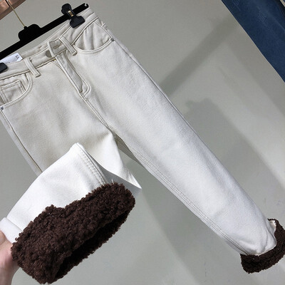 

Winter no down thickening lamb stitching high waist joker thermal stretch nine points Korean version of jeans women