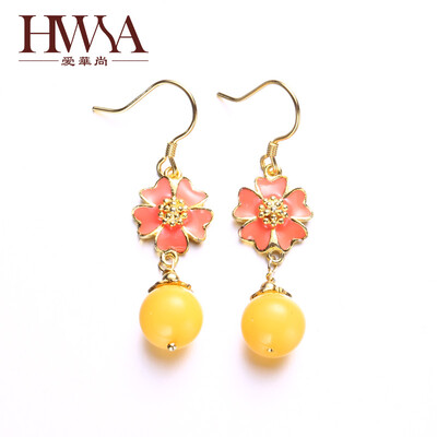 

Ai Hua Shang (HWSA) Shili Peach Amber Beetle earrings with a certificate