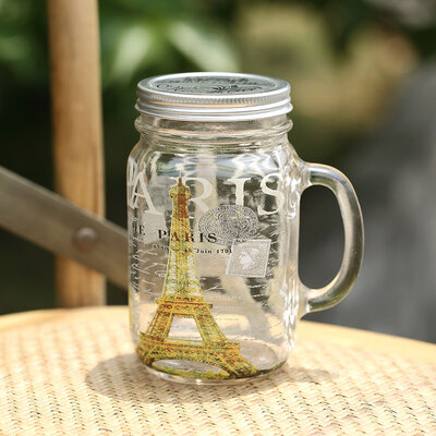 

A Ting Glass Mason Jar with Handle and Lid 23 oz