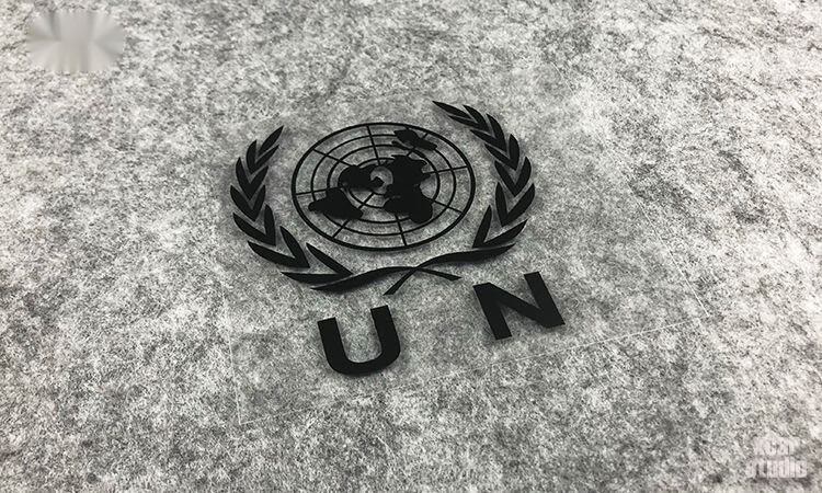 组织标志un联合国维和贴纸汽车电动车电脑电瓶车箱包贴纸 黑色12*11cm