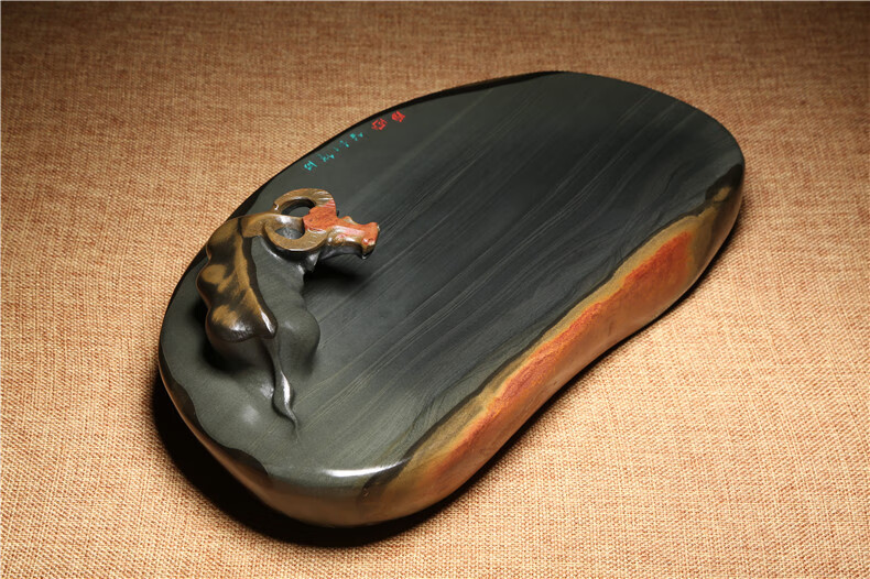 制作工艺:纯手工砚产地:端砚,歙砚类型:砚台货号:zwjfq8ht商品毛重:1.