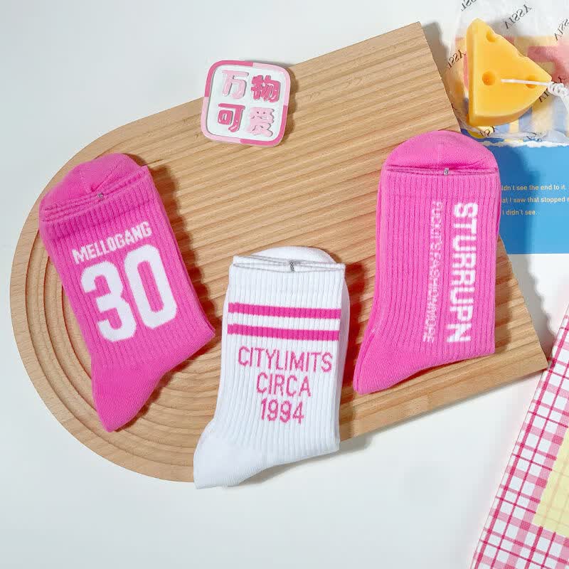 新粉色袜子女潮牌长袜母街头日系卡通牛奶斑韩版玫红色中筒粉斑大宾粉