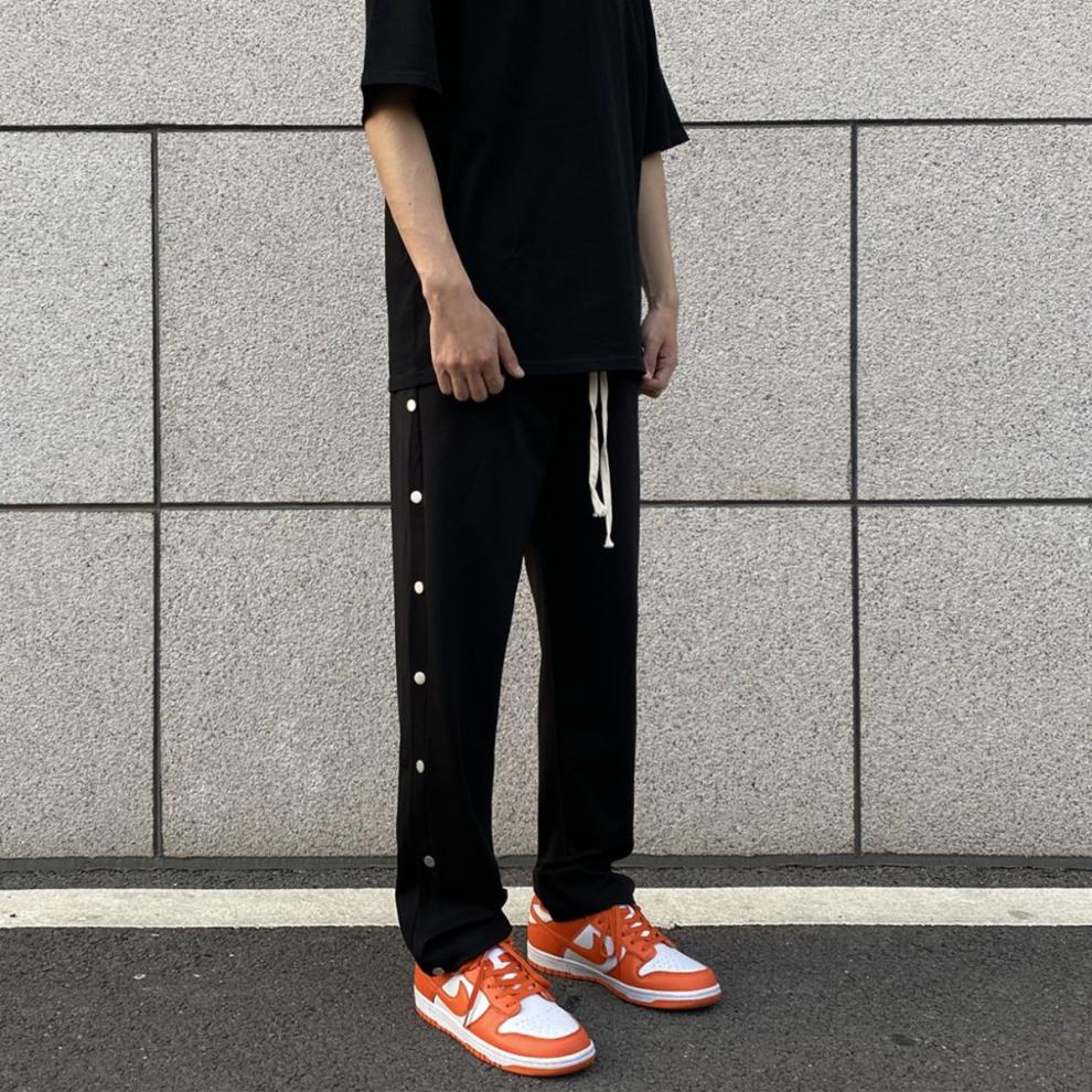 啄木鸟春季男装弹力直筒排扣裤开叉休闲长裤宽松高街秋运动子男早春