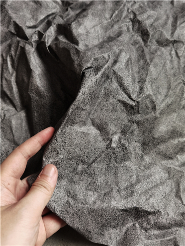 杜邦纸面料岁月沉淀石碑黑灰痕迹杜邦纸面料 设计师肌理造型时装服装