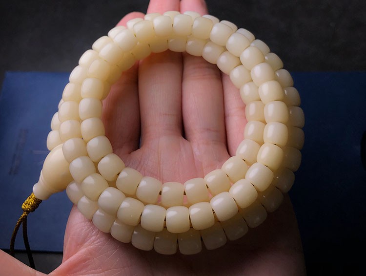 鹿朵 顺纹骆驼骨 108未脱脂原料半透料透料驼骨手串 8*7mm带三通