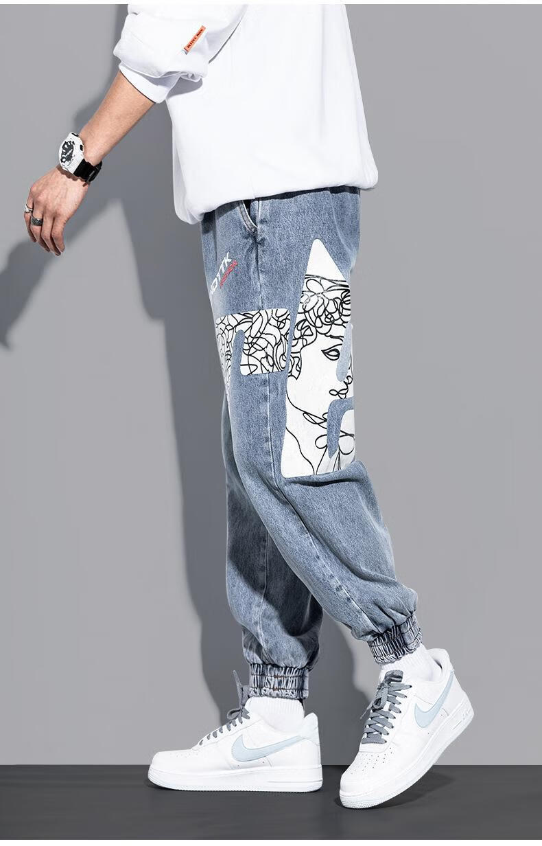 秋冬牛仔裤男潮牌大码宽松嘻哈胖子束脚潮流涂鸦印花哈伦休闲长裤蓝