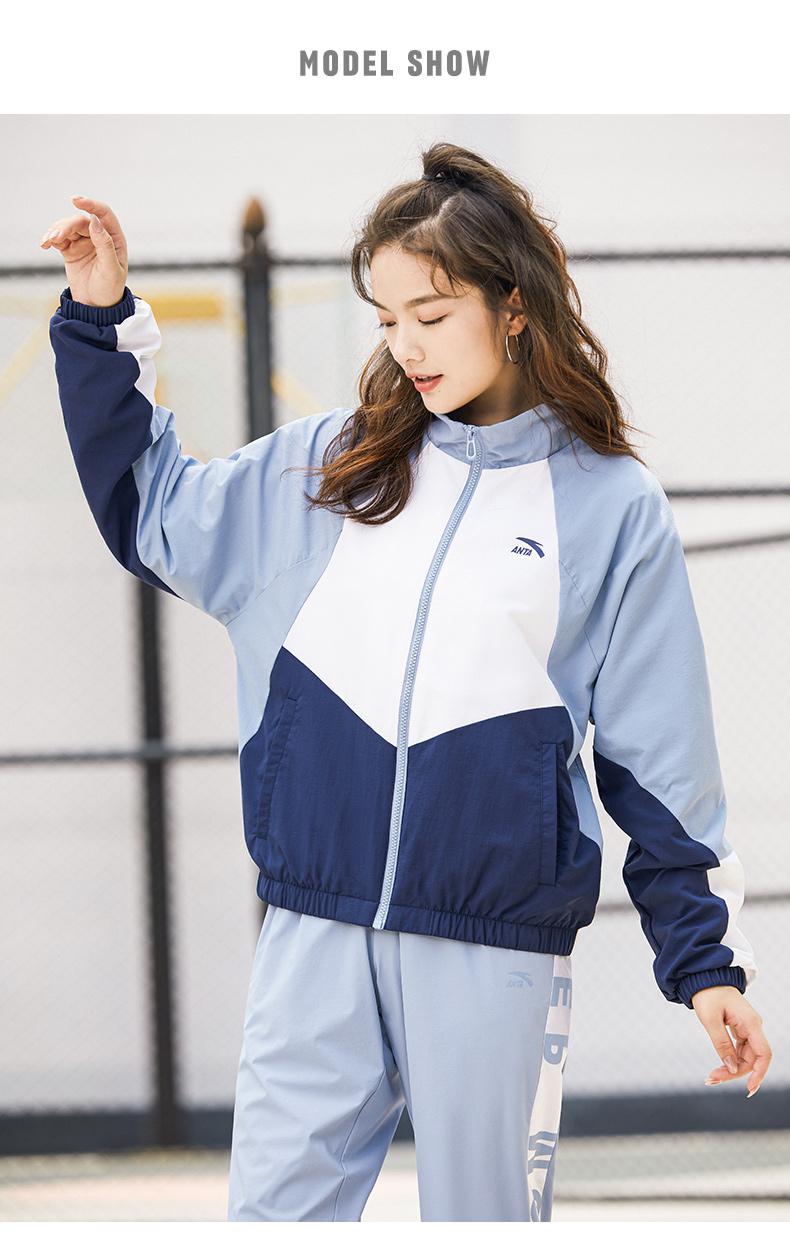 两件套安踏运动套装女2022春季新款梭织防风立领外套休闲裤黄色基础黑