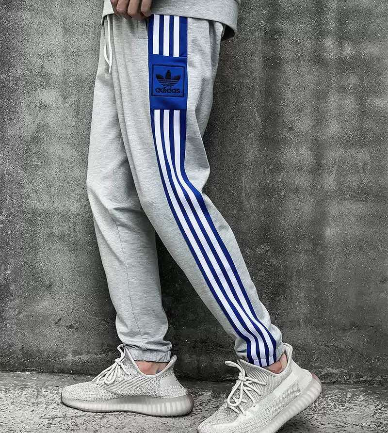 阿迪达斯 (adidas)运动三条杠休闲裤男女潮流宽松情侣长裤春秋三叶草